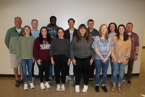 The graduating class of 2024 marks a milestone with the largest group of students entering graduate programs. Of the 11 students accepted, all will attend Missouri State University in their respective fields. (Front row, left to right: Liz Phillips, Bailey Morgan, Kirsten Berndt, Elle Provance, Cheyenne Lundberg, Stevi Combs. Back row, left to right: Dr. Don Hoeck, Taylor Melton, Demarcus Powel-Long, Shane Walters, Chuck Hill, Olivia Richey, Dr. Gary Turbak)